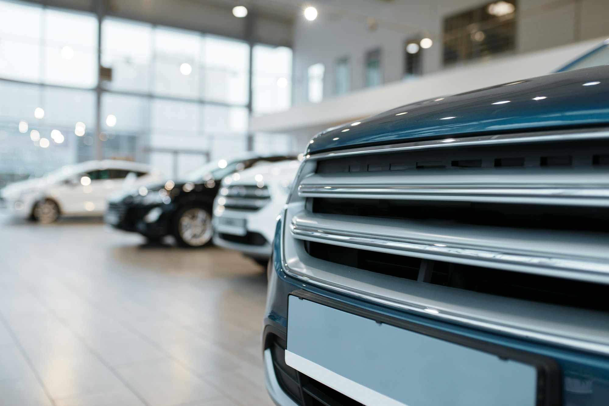 Car dealership, closeup view on radiator grille